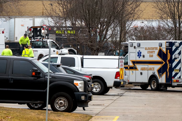 HazMat units and Gloucester Co. emergency units remained outside Savita Naturals in Logan Township on Thursday.