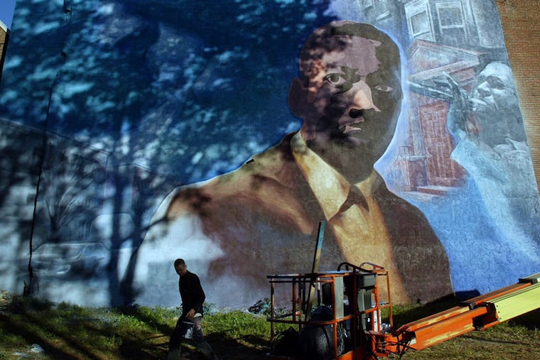 Artist John Lewis created the John Coltrane mural in 2002. (YONG KIM / STAFF PHOTOGRAPHER)