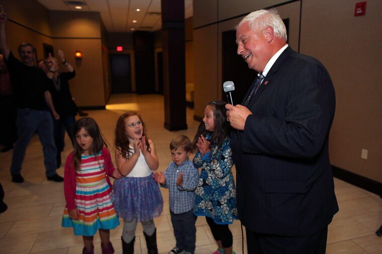 Winner Al Taubenberger with his biggest supporters, his grandkids (from left) Alexander, Cacilie, George and Ava.