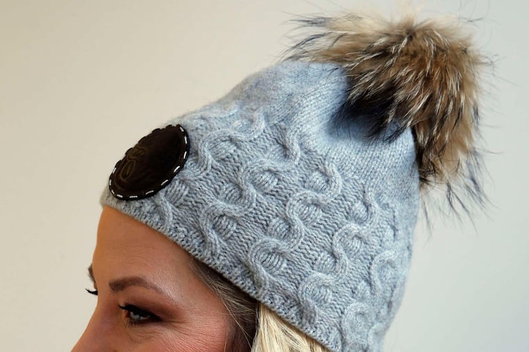 A model wears a Hippy Spirit pom-pom hat on Wednesday, January 27, 2016. The Hippy Spirit hats are available at www.hippyspirit.net and range in price from $105.00 to $170.00.
