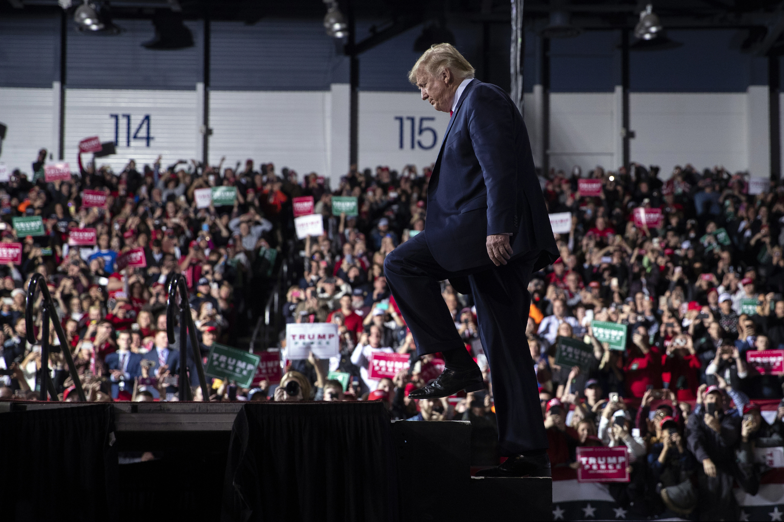 President Donald J. Trump arrives at a campaign rally in Battle Creek, Mich. on Wednesday, the same day the House voted to approve two articles of impeachment against him.