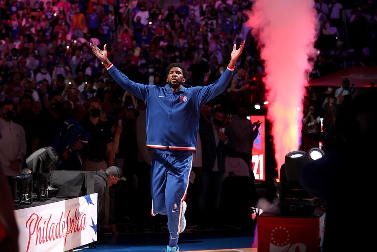 Joel Embiid of the Sixers is introduced as part of the starting lineup for the game against the Nets at the Wells Fargo Center.