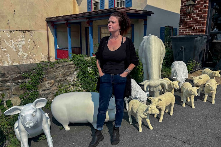 Kenna Day stands outside the gift shop she manages in Middleburg, Va. "I worry it will be disruptive to the calm we have here," she says of Vice President JD Vance moving into a second home in the town.