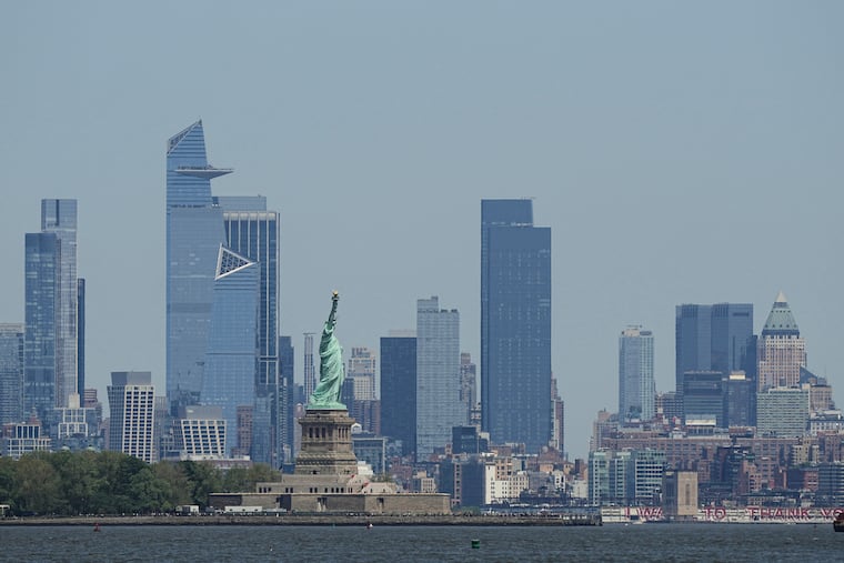 A boat capsized Saturday night near Liberty Island in New York Harbor, leaving a woman and her 5-month-old daughter dead, authorities say.