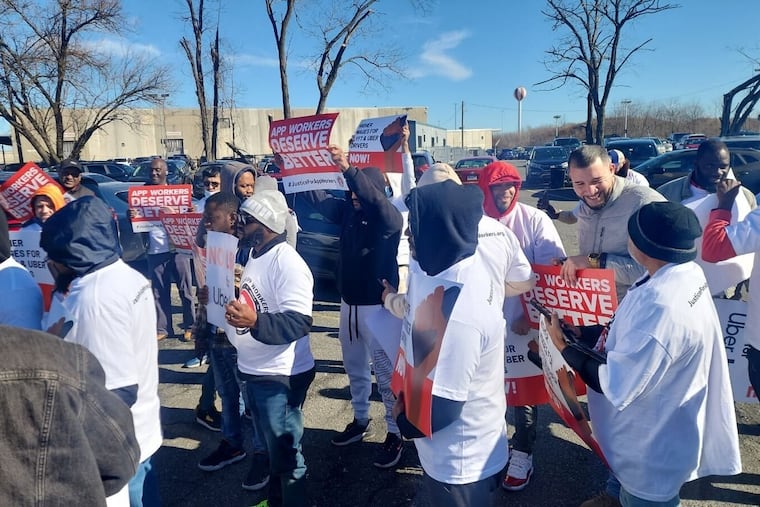 Some drivers for Uber and Lyft refused to give rides to and from Philadelphia International Airport on Valentine's Day, Feb. 14, 2024, and rallied near the airport in Southwest Philadelphia. They hoped to raise awareness around low pay, safety concerns, and struggles with unexpected deactivation of the driver app.