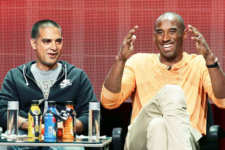 Kobe Bryant (right) with documentarian Gotham Chopra.