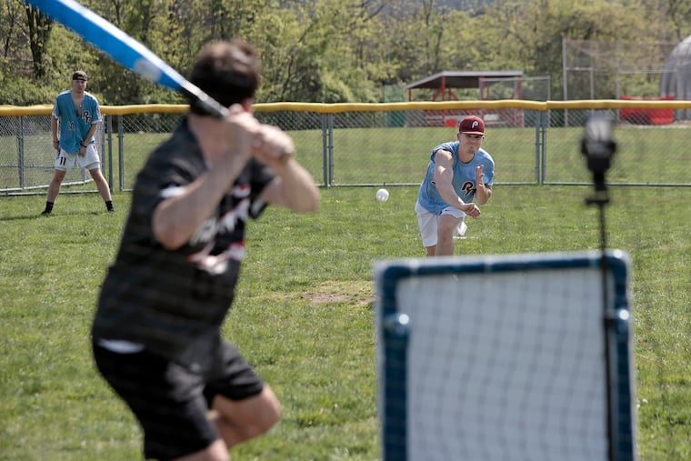 The Phillies' Colin Pollag delivers a pitch to the Royals' Zane Johnston during a Wiffle ball game on April 28 at Catania Park in Ridley Park.