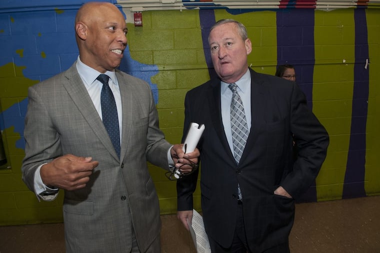(left-right) Philadelphia Public School Superintendent William R. Hite and Mayor Jim Kenney talking before a program at Hartranft Elementary School.