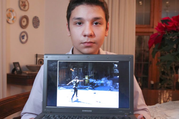 L. Merion High School junior Mahmoud Hallak fled Syria. (Steven M. Falk / Staff Photographer)