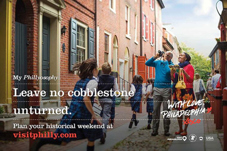 Visit Philadelphia, a private non-profit aimed at boosting tourism in the region, is launching a twist on its "With Love, Philadelphia XXOO" campaign called Phillyosophy with large photos that will appear in online videos, print and billboard ads, on a NJ Transit train going to the Super Bowl and in Center City and New York train stations, aimed at bringing leisure travelers to the region. The ad campaign includes school children and tourists visiting Philadelphia's Elfreths Alley; a mother and child at the PAFA; visitors to family-friendly Franklin Square; diners at Reading Terminal Market, and scenes of Philadelphia's skyline. (handout image)