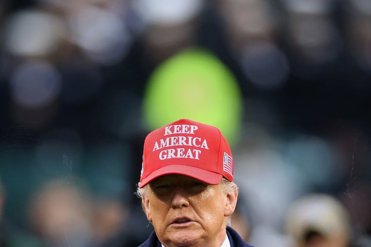 President Donald Trump arrives for the 120th Army-Navy game at Lincoln Financial Field in South Philadelphia on Saturday, Dec. 14, 2019.