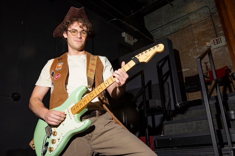 Kohl Pilgrim, the actor bringing Ben Franklin’s rock n’ roll persona to life, stands for a portrait inside the Fringe Arts Theatre during a dress rehearsal for the upcoming musical “The Sound of America” on Wednesday, June 24, 2026.