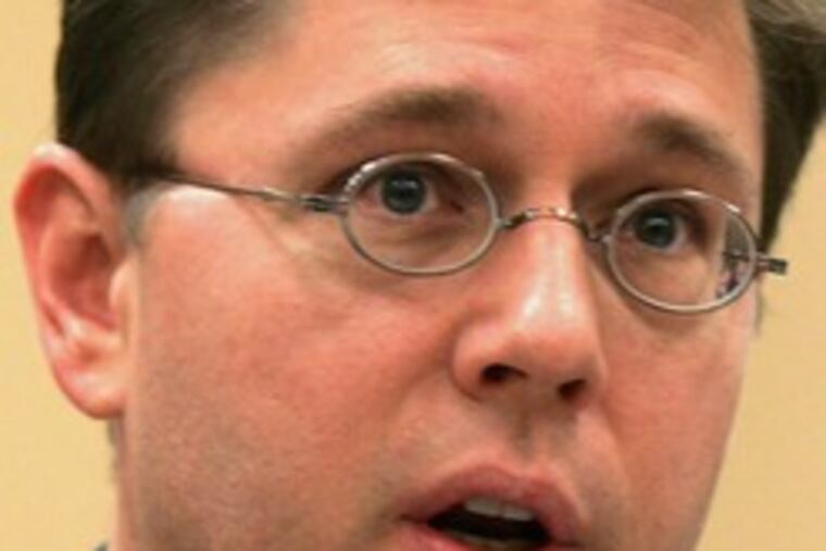 Kevin J. Martin heads the FCC.