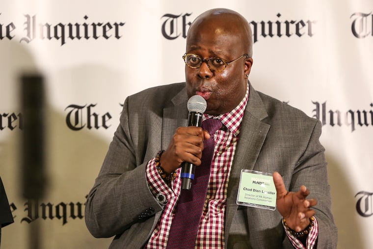 Chad Dion Lassiter speaking at a panel hosted by the Philadelphia Inquirer in April 2019. He moderated a discussion a year after a Center City Starbucks called police to arrest two Black men who were having a business meeting there, without making a purchase. (