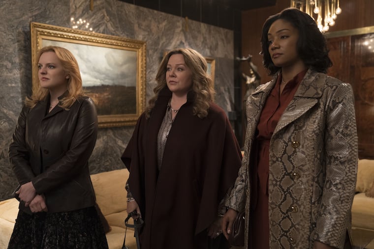 ELISABETH MOSS as Claire, MELISSA McCARTHY as Kathy and TIFFANY HADDISH as Ruby in New Line Cinema’s mob drama “The Kitchen,†a Warner Bros. Pictures release.