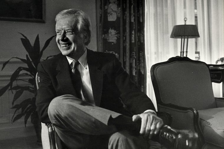 Mr. Carter smiles during a 1986 interview at the St. Regis Hotel in New York.