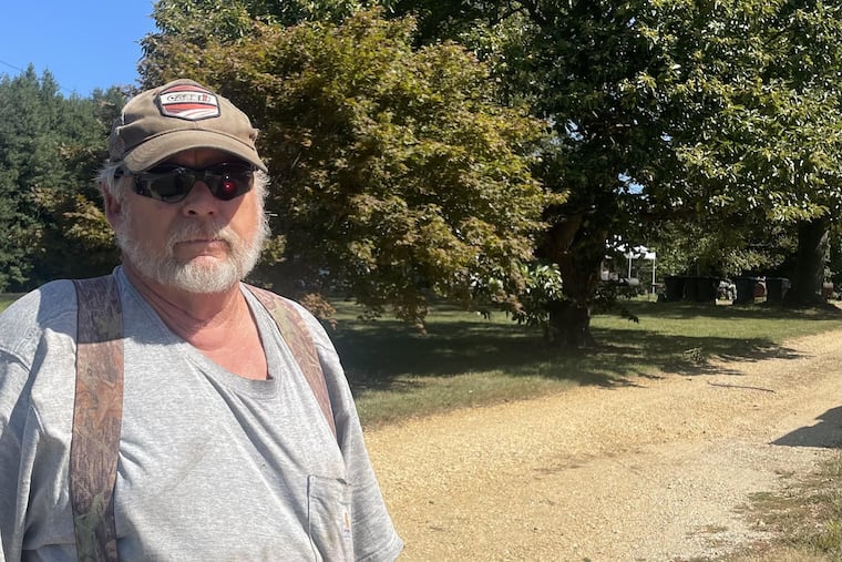 William 'Phil" Reuter, whose family has lived on and farmed land behind him in Harrison Township since 1878, is concerned about the potential impact of a proposed warehouse development there.