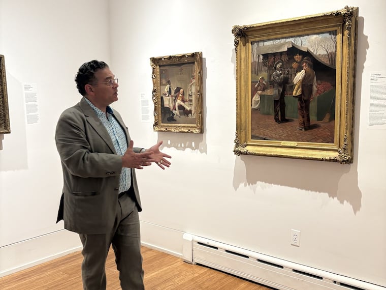 Woodmere director Bill Valerio stands in the Antonelli Gallery at the opening of the Chestnut Hill museum's 'Arc of Promise' exhibition featuring the work of Philadelphia artists who painted Black people with humanity during the Civil War era.