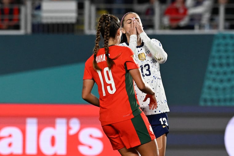 Alex Morgan (right) laments a missed scoring chance during the United States' scoreless tie with Portugal in its group stage finale.