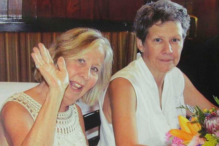 Janice Rhodes (waving) and Marie “Marty” Shively