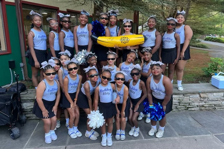 The cheer team at Mastery Charter School at Smedley, which will compete at UCA nationals this weekend, features students from first through sixth grade.