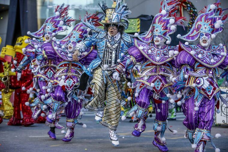 Captain Carmen Maniaci Sr., center, dances with other members of the Avalon String Band.