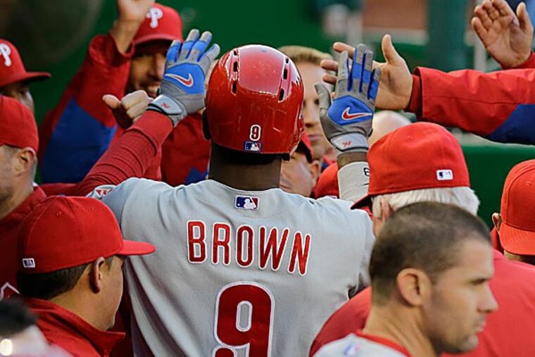 Domonic Brown gets league honor for hitting .348, with doubles, triple and a pair of homers last week. (Alex Brandon/AP)