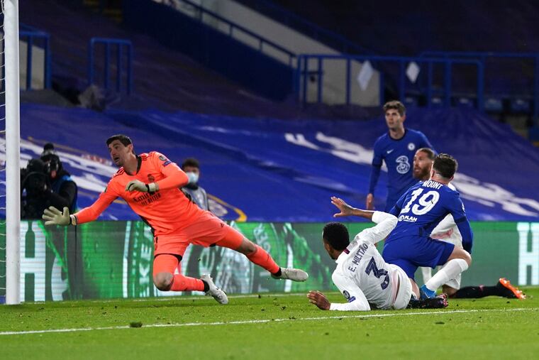 Christian Pulisic, in the background, watches Mason Mount score Chelsea's second goal of the 2-1 win over Real Madrid.