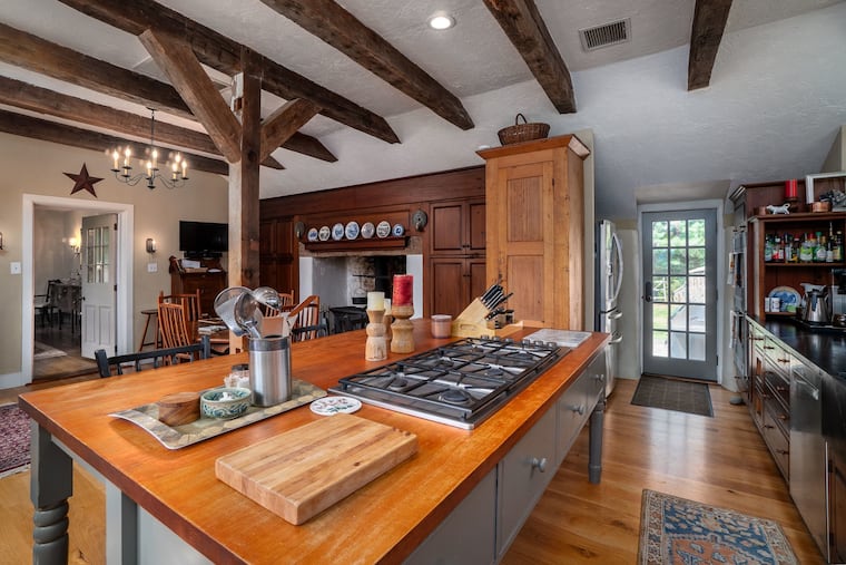 The four-bedroom and three and a half home sits on 15 acres of property which also includes a barn for horses and a three car garage.