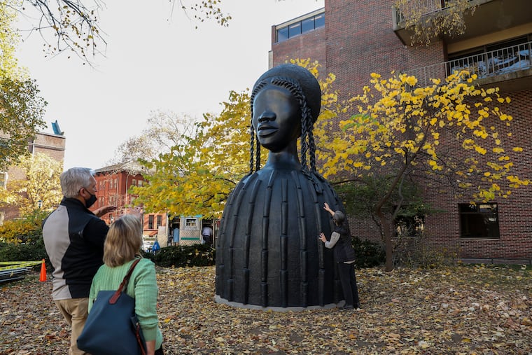 Brick House, by Simone Leigh, is a 16-foot-tall bronze statue of a Black woman recently installed at 34th and Walnut streets on the University of Pennsylvania campus in Philadelphia, Pa. on Tuesday, November 10, 2020. The 5,900 pound statue was a gift from an alumni couple.