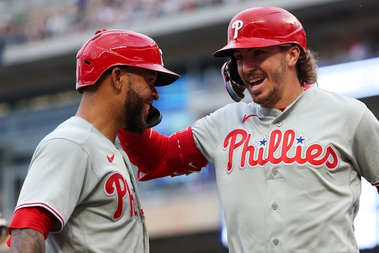 Bryson Stott celebrates his three-run home run with Edmundo Sosa during the fifth inning.
