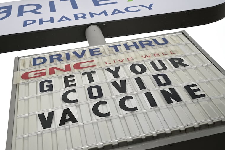 Signage at a drugstore on Torresdale Avenue.