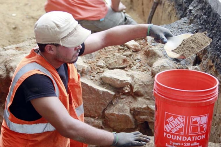 Archaeologists perform test excavations. The land, acquired by Richard Allen in 1810, was a cemetery until about 1868. AKIRA SUWA / Staff Photographer