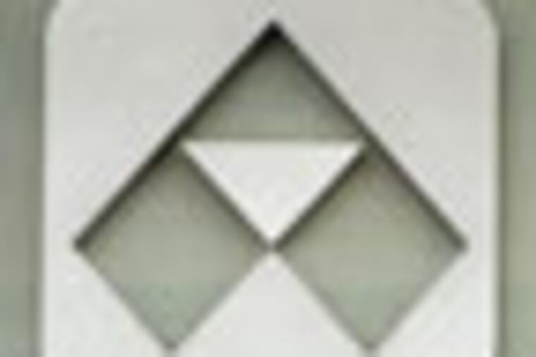 In this April 9, 2011, file photo, the Alcoa headquarters building in downtown Pittsburgh, Saturday, April 9, 2011. Aluminum manufacturer Alcoa Inc. said Monday, July 9, 2012, it lost $2 million in the second-quarter as revenue dropped due to weaker prices and pockets of declining demand in the slowing global economy. (AP Photo/Gene J. Puskar, File)