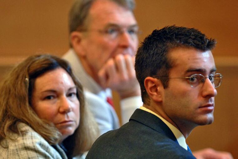 FILE - In this July 10, 2006 file photo, Christopher Porco, right, and his attorneys Terence Kindlon, left, and Laurie Shanks, center, are shown during his trial in the Orange County Courthouse in Goshen, N.Y. A New York judge has temporarily barred Lifetime from showing its made-for-TV movie on Porco, a man from upstate New York convicted in the 2004 axe murder of his father and maiming of his mother. Lifetime has scheduled "Romeo Killer: The Christopher Porco Story" to debut on Saturday night and repeat on Sunday. (AP Photo/Philip Kamrass, Pool, File)