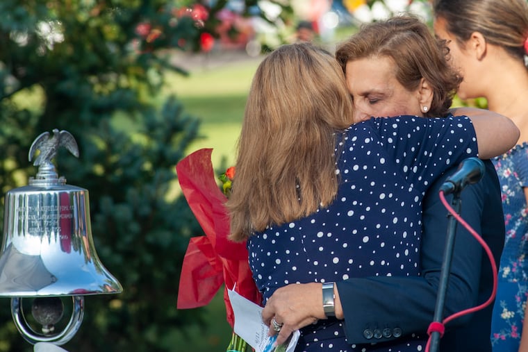 Judi Reiss (right) is hugged by Clara Chich (left) before the 9/11 memorial service Wednesday, September 11, 2019 at Garden of Reflection in Lower Makefield. Judi lost her son, Joshua, in the World Trade Center attack. Today, she is running for Congress.