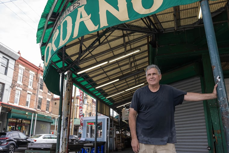 Store co-owner John Giordano reflects on the legacy of P&F Giordano Fruit & Produce at Ninth Street and Washington Avenue on Saturday.