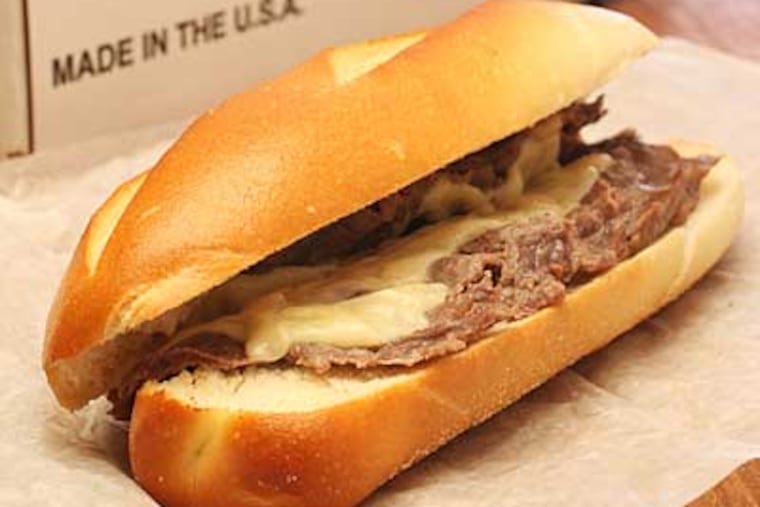 The iconic South Philly cheesesteak, fresh from the microwave. Would it be dee-lish or Nas-Tee? (Michael Bryant / Staff Photographer)