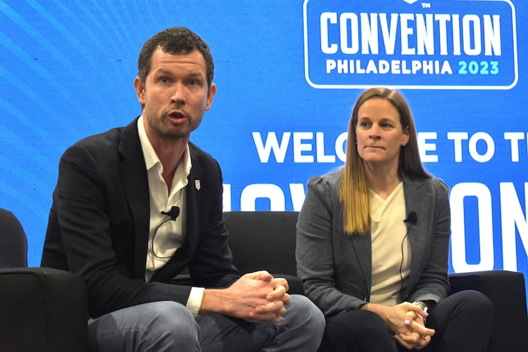 U.S. Soccer Federation CEO JT Batson and president Cindy Parlow Cone at the 2023 United Soccer Coaches Convention, the last time it was in Philadelphia.