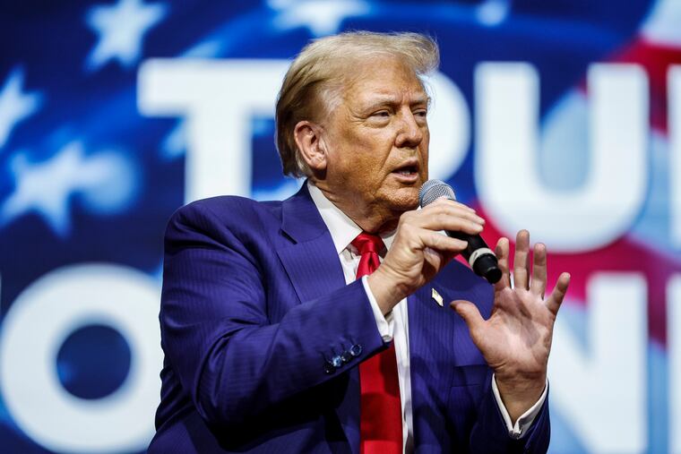 Former President Donald Trump sits for a town hall meeting with South Dakota Governor Kristi Noem in Oaks, Pa., on Monday, Oct. 14, 2024.