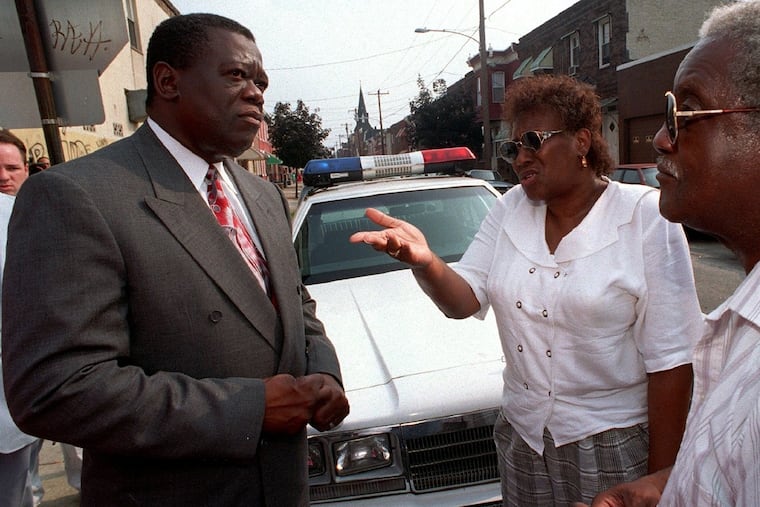 Commissioner Neal, always anxious to hear the concerns of others, listens to residents in 1994.