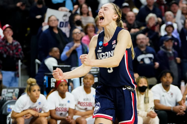 Connecticut guard Paige Bueckers (5) reacts in double overtime against NC State during the East Regional final college basketball game of the NCAA women's tournament, Monday, March 28, 2022, in Bridgeport, Conn.
