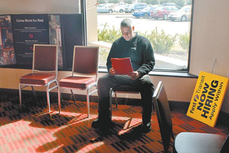 George Landau, of Upper Darby, applies for job as a SEPTA paratransit driver with First Transit, a national bus transportation provider, at a job fair in Northeast Philadelphia. (Tom Gralish / Staff Photographer)