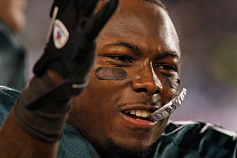 After having another big game, LeSean McCoy celebrates on the bench late in the fourth quarter. (Ron Cortes/Staff Photographer)