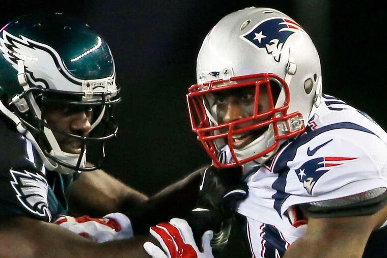 Patriots cornerback Darrelle Revis (right) , a top free agent, may find that championship rings are just as valuable as huge bank accounts. ELISE AMENDOLA / AP