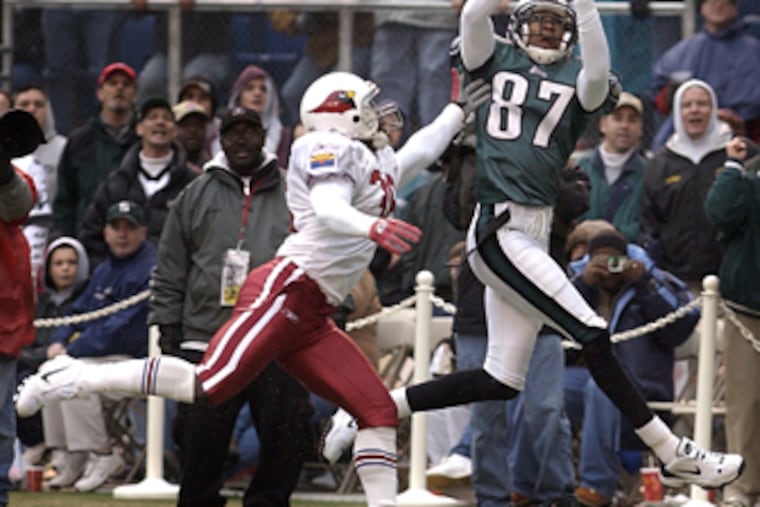 Eagles receiver Todd Pinkston catches one of the touchdown passes thrown by Donovan McNabb on a broken ankle to beat the Arizona Cardinals at the Vet in November 2002.
