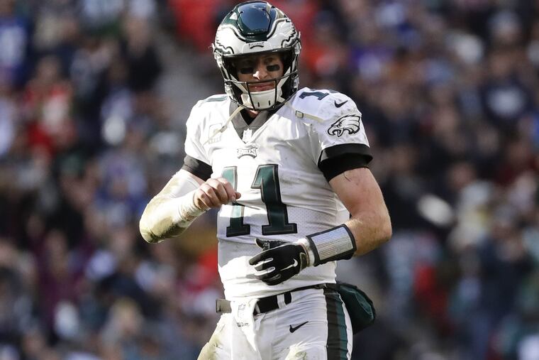 Eagles quarterback Carson Wentz against the Jacksonville Jaguars at Wembley Stadium in London on Sunday, October 28, 2018. YONG KIM / Staff Photographer