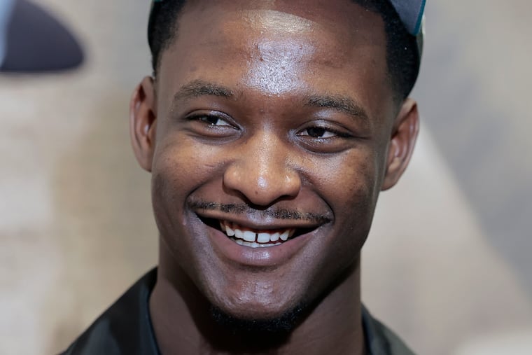 Second-round draft pick Andrew Mukuba speaks at the NovaCare Complex on Saturday.