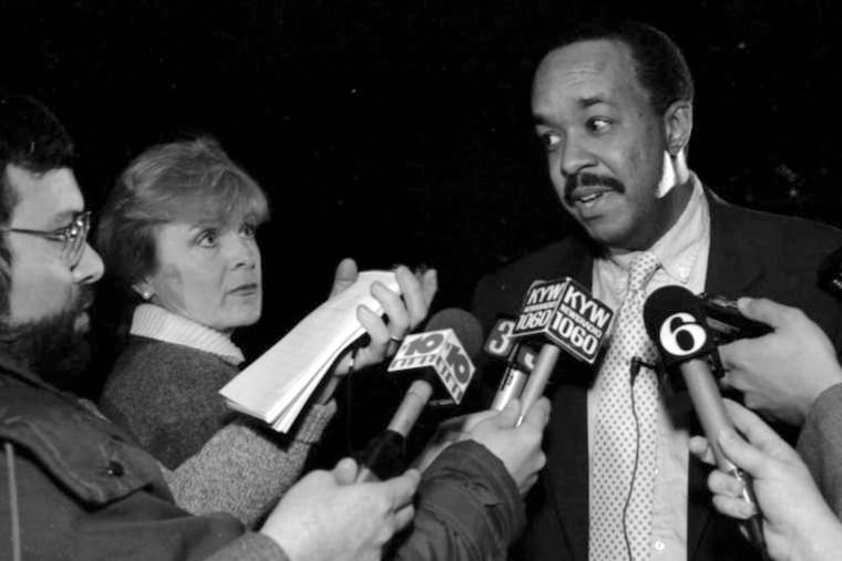 Dr. Robert Ross addresses the media outside the MSB building on February 17, 1991.