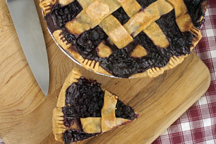 Two pounds of berries in each: Blueberry pie done right by MyHouse Cookies, at Oakmont Farmers Market, Havertown. (RON TARVER / Staff Photographer)
